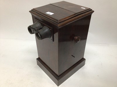 Lot 265 - Table top stereo viewer with cards, magic lantern and a film strip viewer