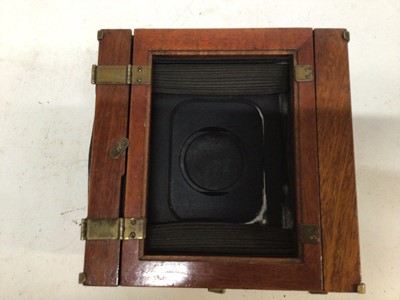 Lot 268 - Two mahogany and brass plate cameras, a Thornton Packard Ruby and an E.T. Underwood with two extra shutters