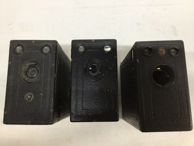 Lot 270 - Four early falling plate box cameras including Midg with an early large stereo box camera retailed by Bedford of Ipswich