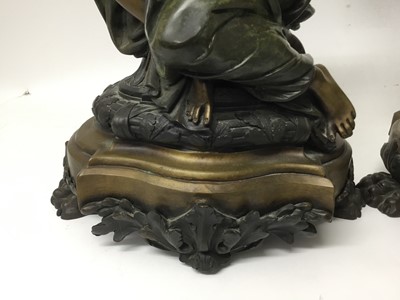 Lot 384 - Carrier-Belleuse (1824-1877) - Impressive pair of bronze and patinated bronze figural urns, each modelled as a Classical maiden cradling an Etruscan style vase raised on stepped shaped plinth with...