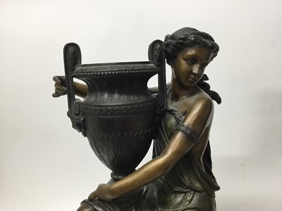 Lot 384 - Carrier-Belleuse (1824-1877) - Impressive pair of bronze and patinated bronze figural urns, each modelled as a Classical maiden cradling an Etruscan style vase raised on stepped shaped plinth with...
