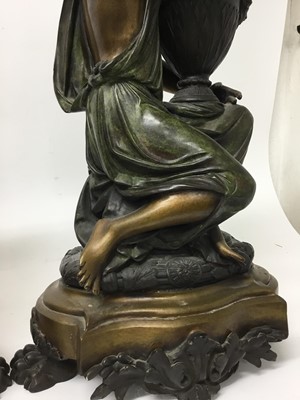 Lot 384 - Carrier-Belleuse (1824-1877) - Impressive pair of bronze and patinated bronze figural urns, each modelled as a Classical maiden cradling an Etruscan style vase raised on stepped shaped plinth with...