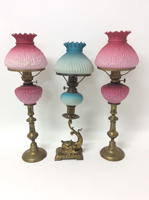 Lot 388 - Pair of Edwardian peg lamps, together with another