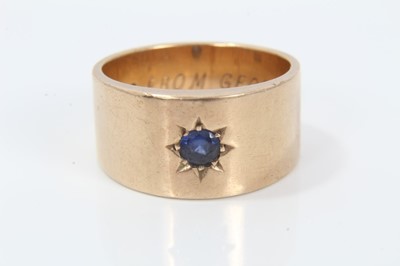 Lot 347 - 9ct gold ring with blue stone in star shape gypsy setting