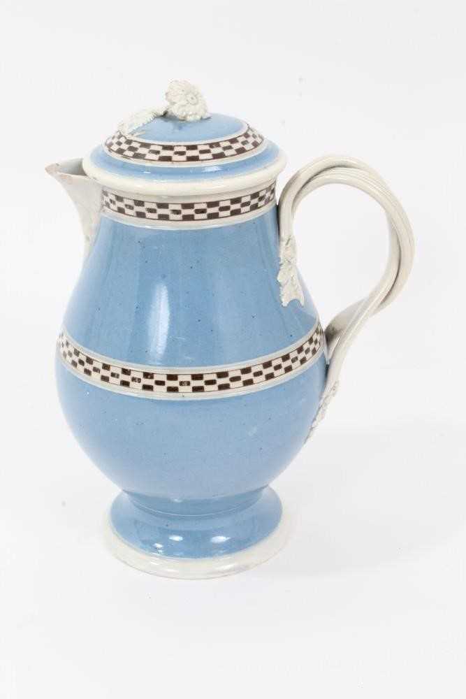 Lot 22 - Pearlware Mocha Ware milk jug and cover, c.1800