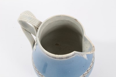 Lot 22 - Pearlware Mocha Ware milk jug and cover, c.1800