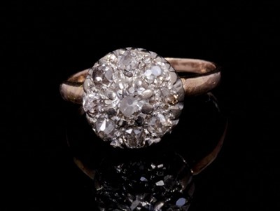 Lot 240 - Diamond cluster ring with a flower head cluster of nine old mine cut diamonds
