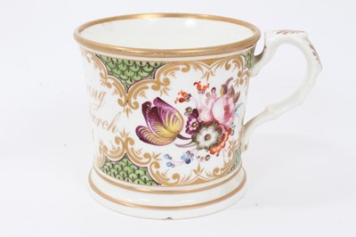 Lot 28 - Staffordshire flower painted jug, dated 1853, and two similar mugs