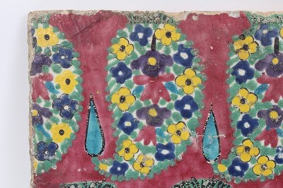 Lot 41 - Persian Qajar polychrome painted tile