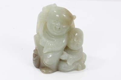 Lot 424 - Chinese mottled celedon jade carving of the Hehe Erxian, 5.5cm high