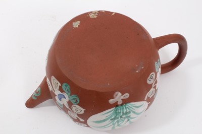 Lot 66 - Chinese Yixing teapot and strainer, enamelled with two roundels containing flowers and foliage, with further floral motifs