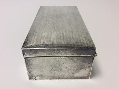 Lot 152 - George V silver cigarette box of rectangular form, domed hinged cover with engine turned decoration, cedar lined interior (Birmingham 1920), makers mark rubbed, 17.7cm in length