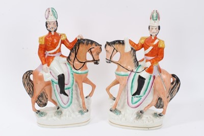 Lot 75 - Collection of Victorian Staffordshire figures, including a pair of soldiers on horseback, a pair of Highland children standing next to sheep, and three others, along with a Crown Derby inkstand pai...
