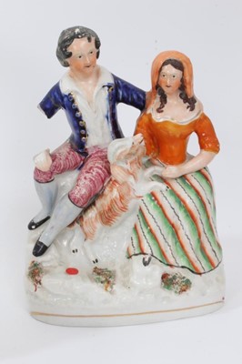 Lot 75 - Collection of Victorian Staffordshire figures, including a pair of soldiers on horseback, a pair of Highland children standing next to sheep, and three others, along with a Crown Derby inkstand pai...