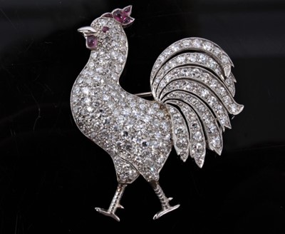 Lot 322 - Impressive diamond and ruby novelty brooch in the form of a cockerel with pavé set single cut diamonds and ruby detail, in platinum setting with French control marks, estimated total diamond weight...