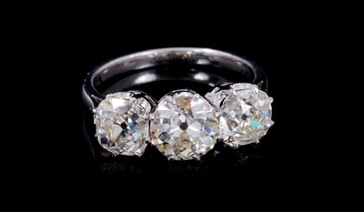 Lot 267 - Impressive diamond three stone ring with three old cut cushion-shape diamonds estimated to weigh approximately 4.05ct in total, in claw setting on 18ct white gold shank. Ring size N