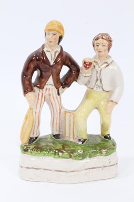 Lot 76 - Collection of eight Staffordshire figures, some Victorian and some later, including a pair of cricketers, The Falconer, etc, between 15cm and 21cm height