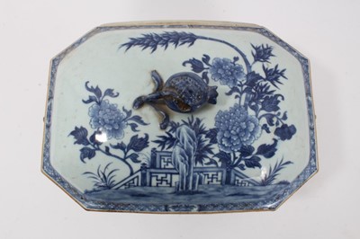 Lot 81 - 18th century Chinese blue and white export tureen, decorated with flowers and butterflies and rabbit-head handles, 34cm across x 22cm height