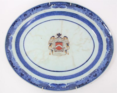 Lot 329 - Late 18th century Chinese export armorial porcelain platter, with central enamelled armorial and underglaze blue pattern to border, 40cm across