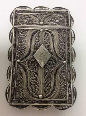 Lot 182 - 19th Century Continental white metal filigree card case, central cartouche with engraved initials, apparently unmarked, 10cm in overall length