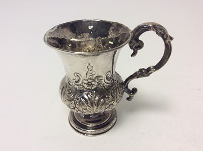 Lot 184 - Victorian silver christening mug of baluster form with chased floral and scroll decoration and loop handle, (Birmingham 1854), maker George Unite, at approximately 4oz, 9.5cm in height