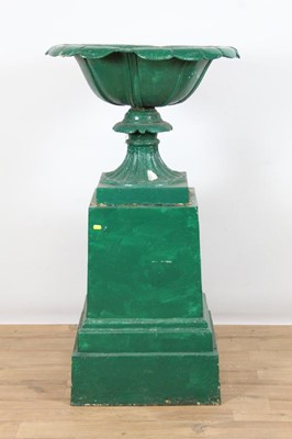 Lot 974 - Large Victorian cast iron garden urn on plinth