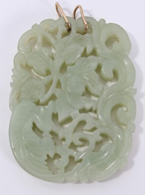 Lot 305 - Chinese carved green hardstone pendant