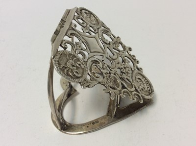 Lot 134 - Late Victorian silver heart shaped letter clip with pierced and Zodiac sign decoration, (London 1898), maker Grey & Co, 6.5cm in length