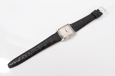 Lot 356 - Art Deco gentlemen's Girard-Perregaux wristwatch with manual wind movement, the square dial with Arabic and baton hour markers and luminous steel hands, curved square glass in a tank-shaped stainle...
