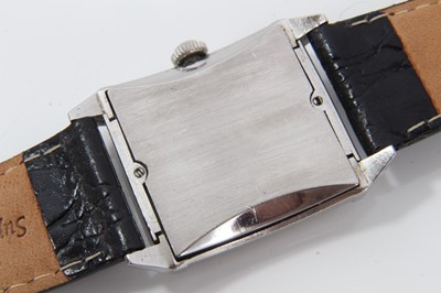 Lot 356 - Art Deco gentlemen's Girard-Perregaux wristwatch with manual wind movement, the square dial with Arabic and baton hour markers and luminous steel hands, curved square glass in a tank-shaped stainle...