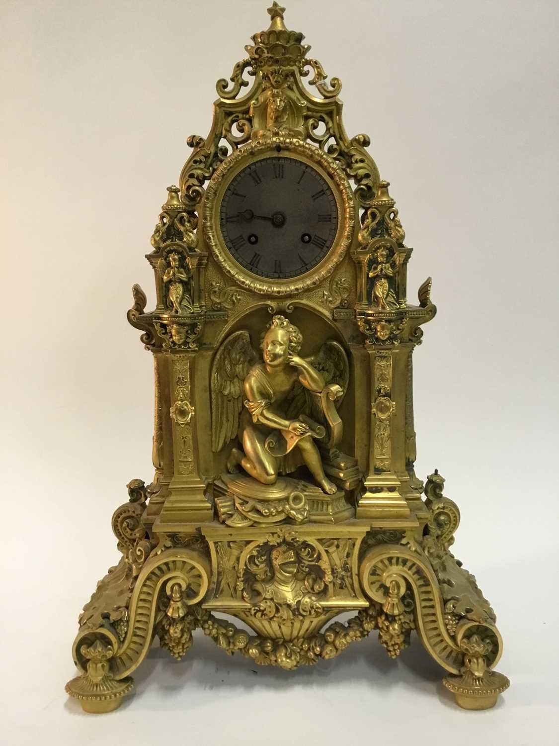 Lot 527 - Good quality French Charles X ormolu mantle clock with ornate cast cherubs , lion mask and knights helm decoration , French 8 day movement striking on bell with silk suspension pendulum and outside...