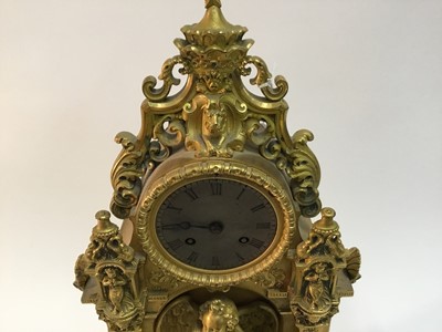 Lot 527 - Good quality French Charles X ormolu mantle clock with ornate cast cherubs , lion mask and knights helm decoration , French 8 day movement striking on bell with silk suspension pendulum and outside...