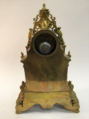 Lot 527 - Good quality French Charles X ormolu mantle clock with ornate cast cherubs , lion mask and knights helm decoration , French 8 day movement striking on bell with silk suspension pendulum and outside...