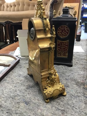 Lot 527 - Good quality French Charles X ormolu mantle clock with ornate cast cherubs , lion mask and knights helm decoration , French 8 day movement striking on bell with silk suspension pendulum and outside...