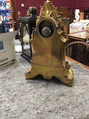 Lot 527 - Good quality French Charles X ormolu mantle clock with ornate cast cherubs , lion mask and knights helm decoration , French 8 day movement striking on bell with silk suspension pendulum and outside...