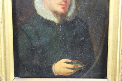 Lot 602 - English School, 17th/18th century oil on canvas laid down onto board, head and shoulders portrait of a young man