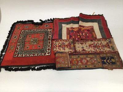 Lot 1941 - Two vintage African mirror-work sashes and an embroidered wool square with tassel fringing.   Plus five hand stitched tapestry circular panels..