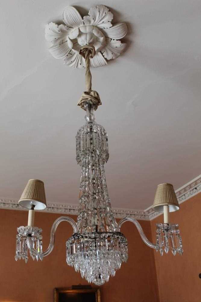 Lot 1001 - An impressive early 19th century cut glass three branch chandelier, converted to electricity
