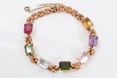 Lot 308 - Rose gold and multi-gem bracelet with rectangular step-cut semi-precious stones in rose gold setting, 18cm