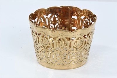 Lot 275 - 19th century gold cuff bangle with a wide pierced and engraved band with gothic floral decoration and buckle style clasp. Approximately 52mm wide
