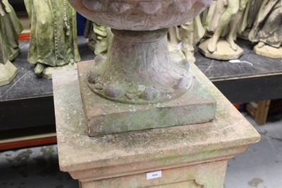 Lot 854 - Monumental pair of ceramic garden urns on plinths