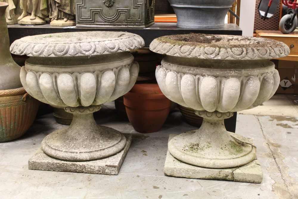 Lot 859 - Pair of massive concrete garden urns