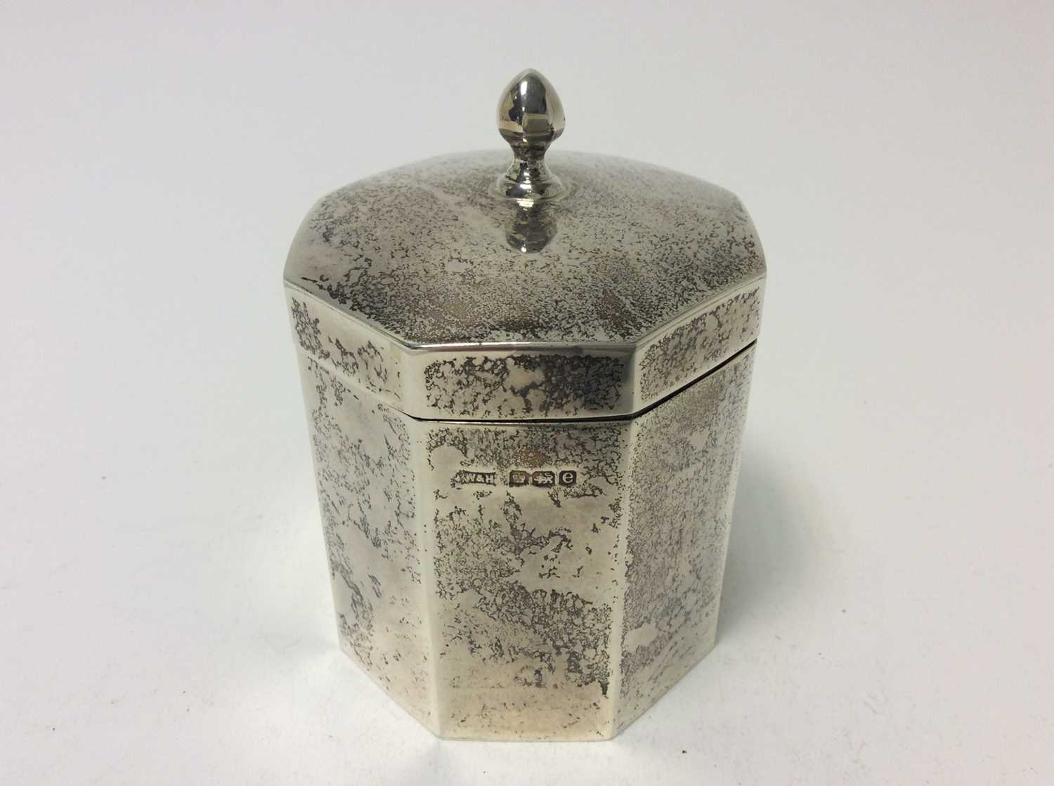 Lot 188 - George V silver tea caddy of faceted octagonal form with hinged cover and gilded interior, (Sheffield 1922) maker, Walker & Hall, at approximately 7oz, 10cm in height