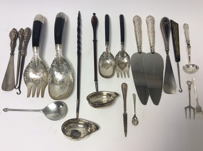 Lot 210 - Two Georgian silver toddy ladles set with coins, together with two silver handled Kings pattern pie servers and other various silver and white metal items (various dates and makers) (Qty)