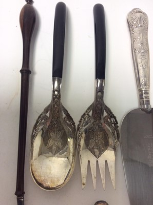 Lot 210 - Two Georgian silver toddy ladles set with coins, together with two silver handled Kings pattern pie servers and other various silver and white metal items (various dates and makers) (Qty)