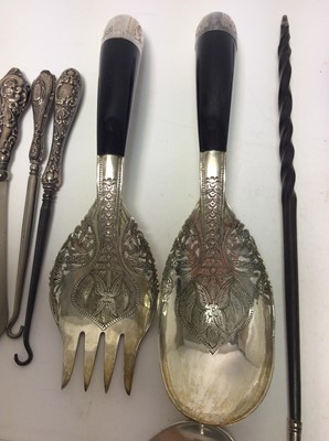 Lot 210 - Two Georgian silver toddy ladles set with coins, together with two silver handled Kings pattern pie servers and other various silver and white metal items (various dates and makers) (Qty)