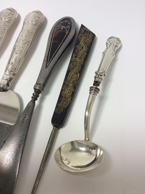 Lot 210 - Two Georgian silver toddy ladles set with coins, together with two silver handled Kings pattern pie servers and other various silver and white metal items (various dates and makers) (Qty)