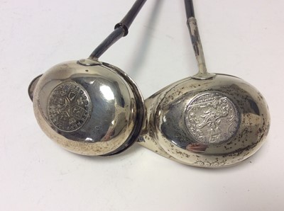 Lot 210 - Two Georgian silver toddy ladles set with coins, together with two silver handled Kings pattern pie servers and other various silver and white metal items (various dates and makers) (Qty)