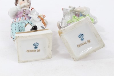 Lot 122 - Six pairs of Sitzendorf porcelain figures, mostly with floral encrusted scrollwork bases, printed marks, between 11cm and 19cm height