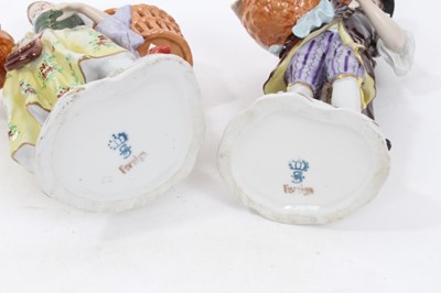 Lot 122 - Six pairs of Sitzendorf porcelain figures, mostly with floral encrusted scrollwork bases, printed marks, between 11cm and 19cm height